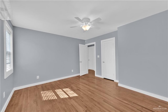 517 E Jones Ave, Pharr, TX 78577 - unfurnished bedroom featuring wood finished floors and ceiling fan