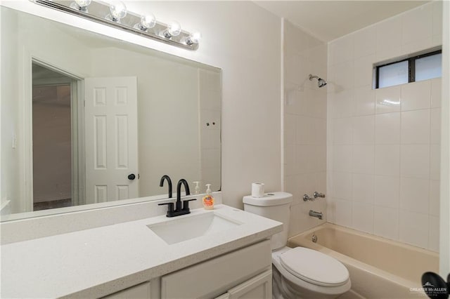 full bathroom with shower / washtub combination, vanity, and toilet