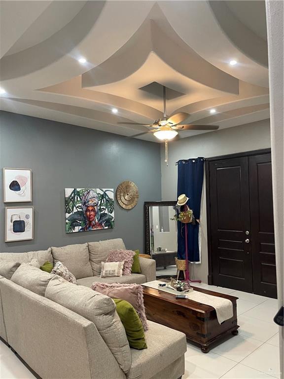 2205 Griffin Pass, Edinburg, TX 78542 - living room with ceiling fan, recessed lighting, and light tile patterned flooring