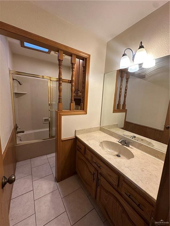 2711 Ashley Ct, Pharr, TX 78577 - full bath with tile patterned flooring, washtub / shower combination, and vanity