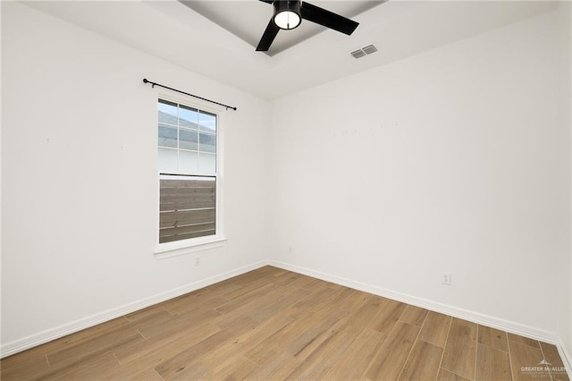 3515 Elevation Dr, Edinburg, TX 78542 - spare room with baseboards, a ceiling fan, light wood finished floors, and visible vents