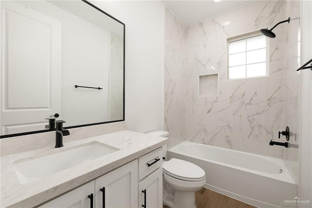 3515 Elevation Dr, Edinburg, TX 78542 - bathroom featuring wood finished floors, toilet, vanity, and  shower combination