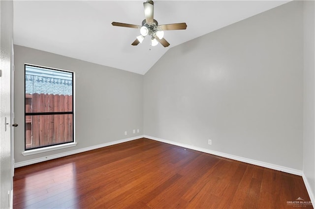 empty room featuring hardwood / wood-style floors, ceiling fan, and lofted ceiling