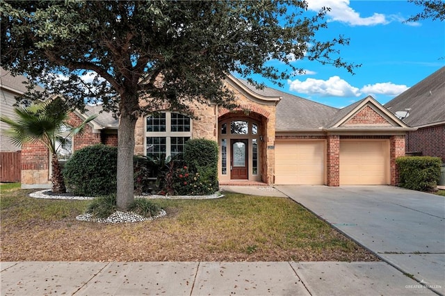 view of front of property featuring a garage