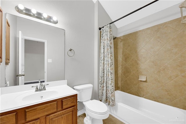 full bathroom featuring shower / tub combo with curtain, vanity, and toilet