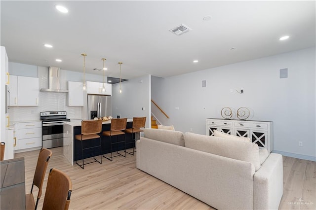 living room featuring light wood-type flooring