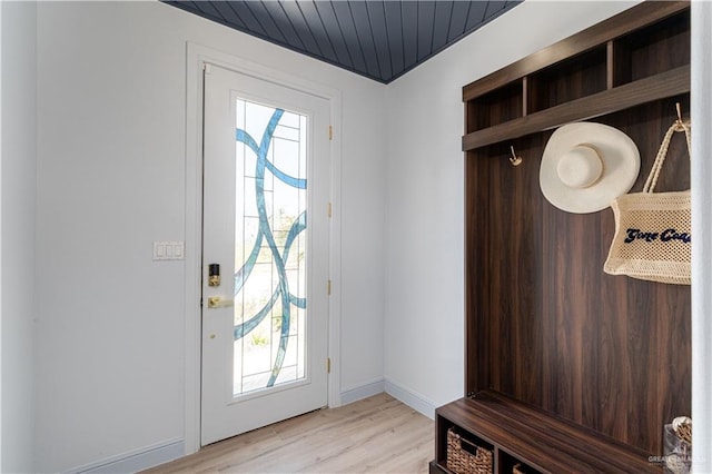 mudroom featuring wooden ceiling, a healthy amount of sunlight, and light hardwood / wood-style floors