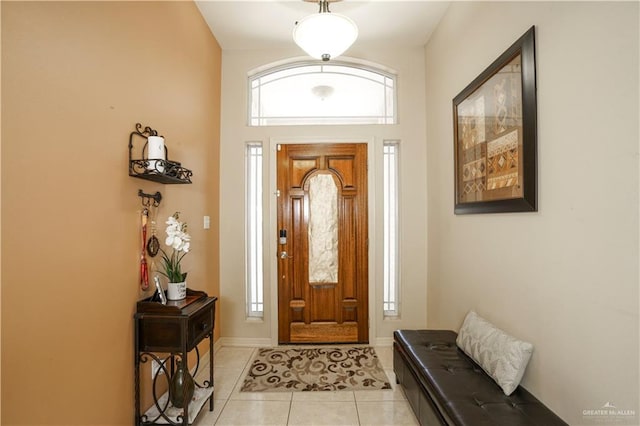 1110 E 8th St N, San Juan, TX 78589 - entryway with light tile patterned floors and baseboards
