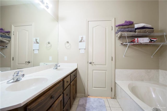 1110 E 8th St N, San Juan, TX 78589 - bathroom with double vanity, tile patterned flooring, and a garden tub