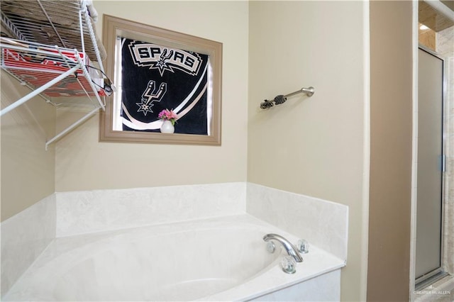 1110 E 8th St N, San Juan, TX 78589 - full bathroom with a shower stall and a bath
