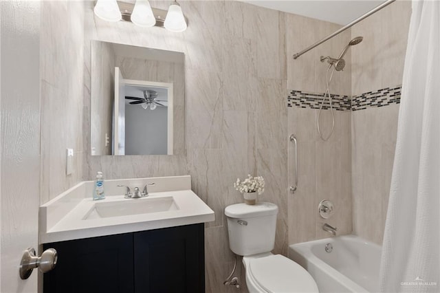 full bathroom with shower / bath combo, tile walls, vanity, and toilet