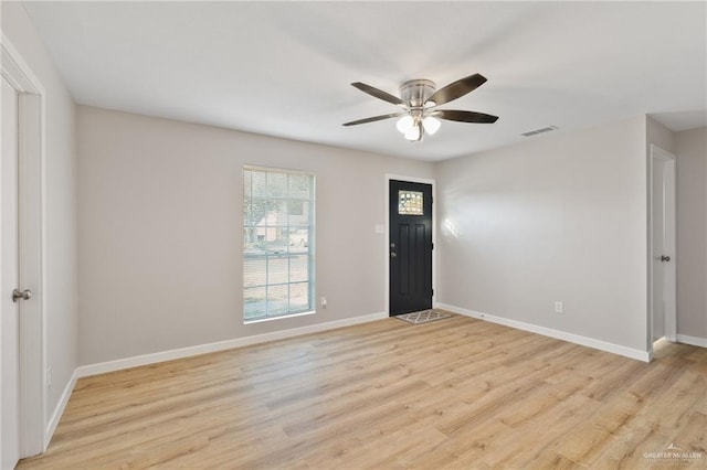 entrance foyer featuring ceiling fan and light hardwood / wood-style floors