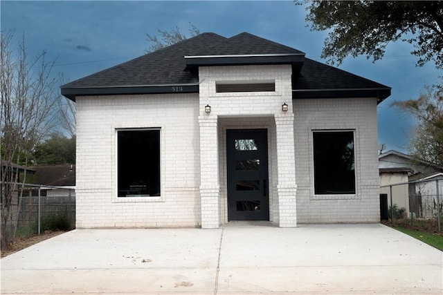 513 E Hawk Ave, Pharr, TX 78577 - view of front of house with brick siding and a shingled roof