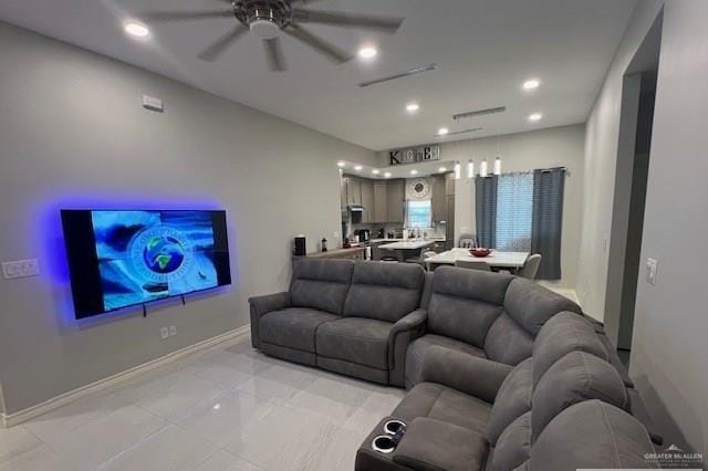 living room with ceiling fan