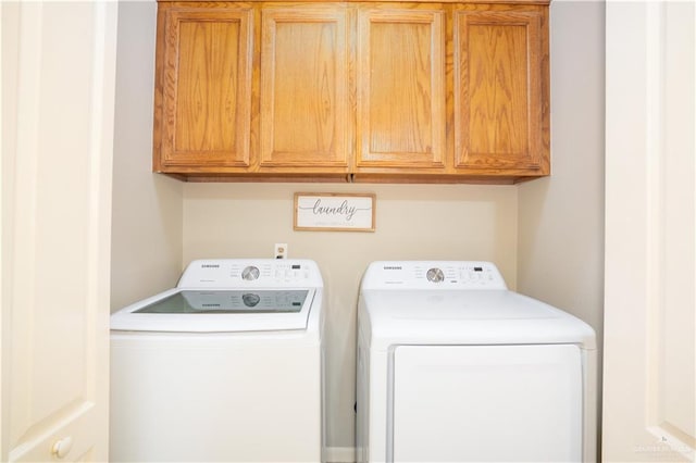 1212 Sonora St, Mission, TX 78572 - laundry area with independent washer and dryer and cabinet space