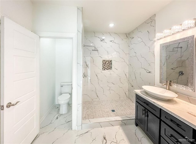 full bathroom with vanity, a marble finish shower, recessed lighting, toilet, and marble finish floor