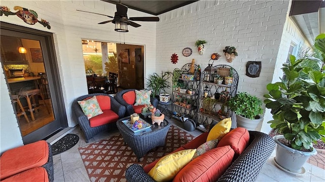 view of patio featuring an outdoor living space and ceiling fan