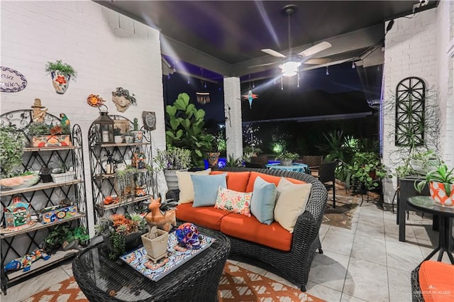 view of patio / terrace with a ceiling fan and an outdoor living space