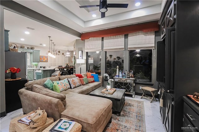 living room featuring recessed lighting, marble finish floor, visible vents, and ceiling fan