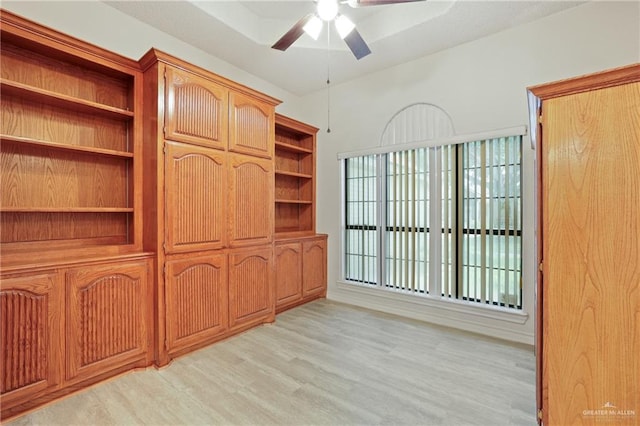 interior space featuring light wood-style floors and ceiling fan