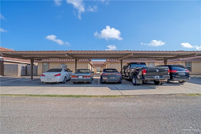 view of car parking featuring a carport