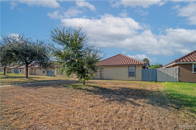 view of property exterior featuring a yard