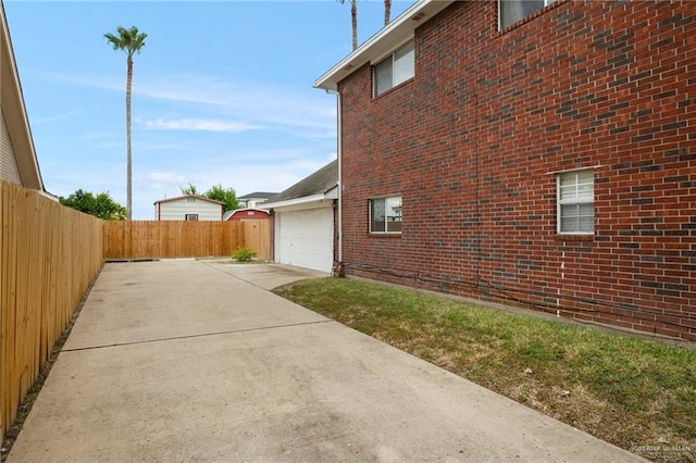 view of side of home with a garage