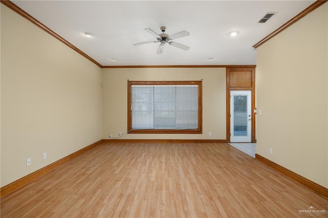 empty room featuring light wood-type flooring, ceiling fan, and ornamental molding