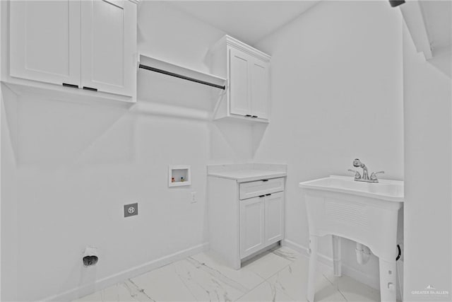 laundry room with baseboards, marble finish floor, hookup for a washing machine, and hookup for an electric dryer