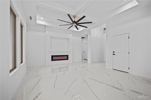 living area featuring marble finish floor, recessed lighting, baseboards, and a glass covered fireplace