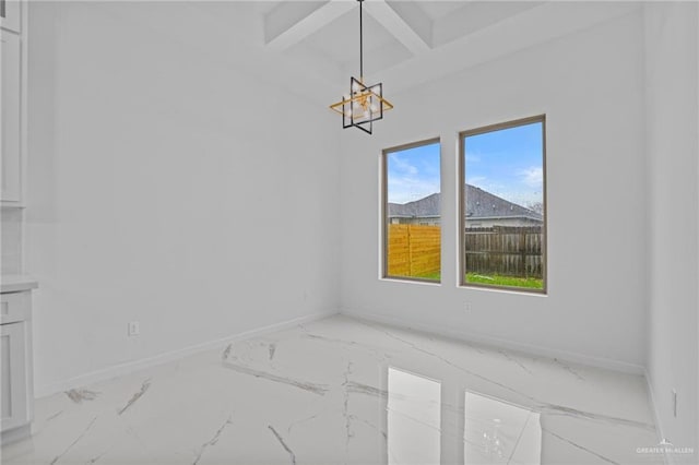 unfurnished dining area with marble finish floor, coffered ceiling, beamed ceiling, and baseboards