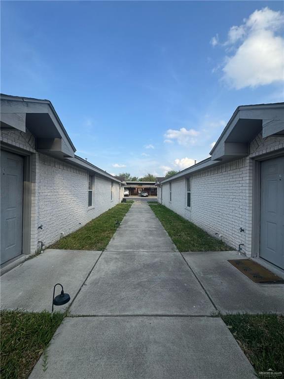 view of home's exterior featuring brick siding