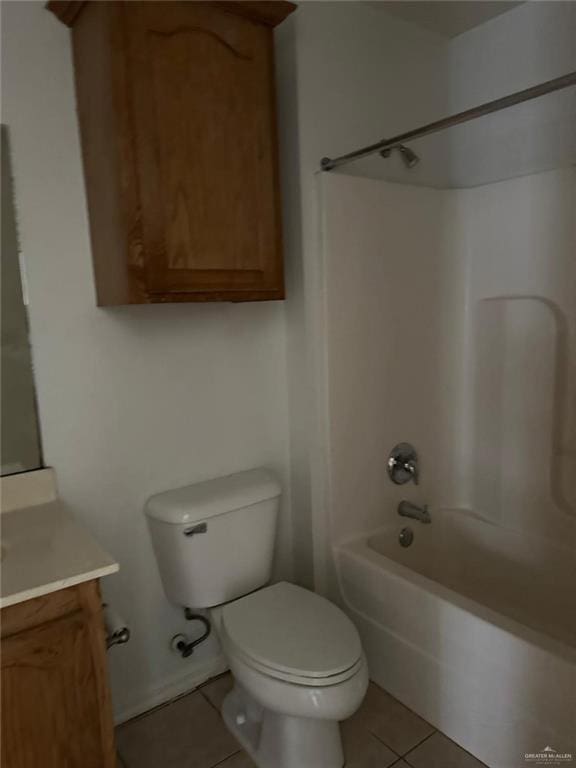 bathroom with tile patterned floors, vanity, toilet, and shower / bath combination