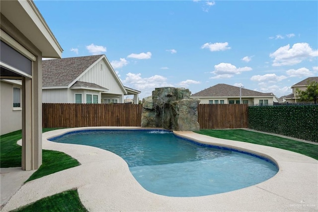 view of swimming pool featuring pool water feature