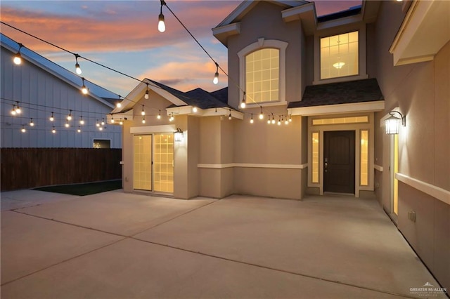 view of front of house with a patio area