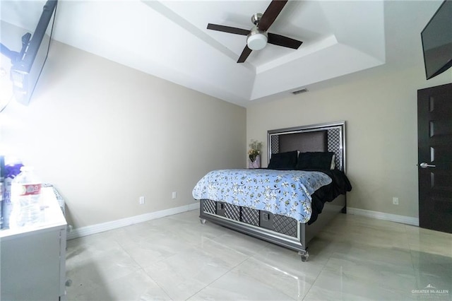 1833 Cortez Dr, Alamo, TX 78516 - bedroom with a raised ceiling and ceiling fan
