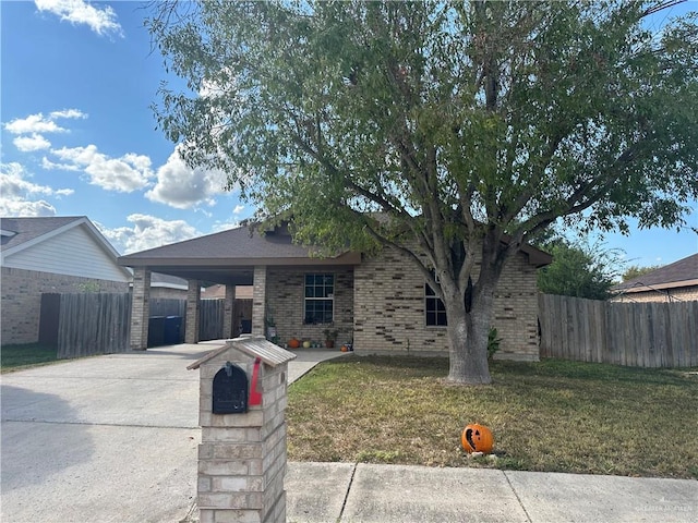 ranch-style home with a front lawn