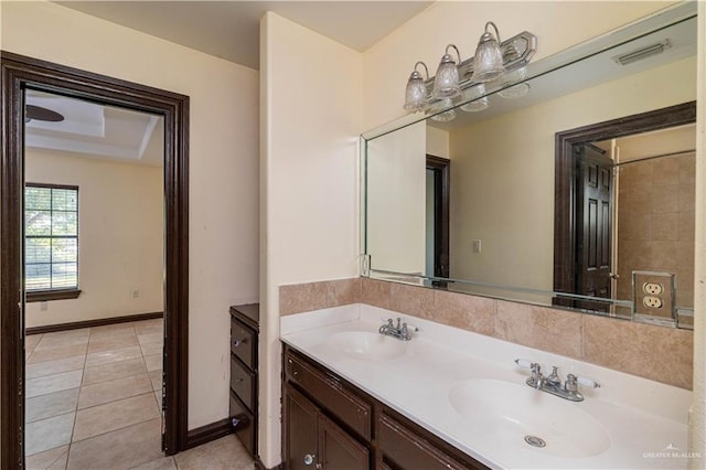 bathroom featuring tile patterned floors and vanity