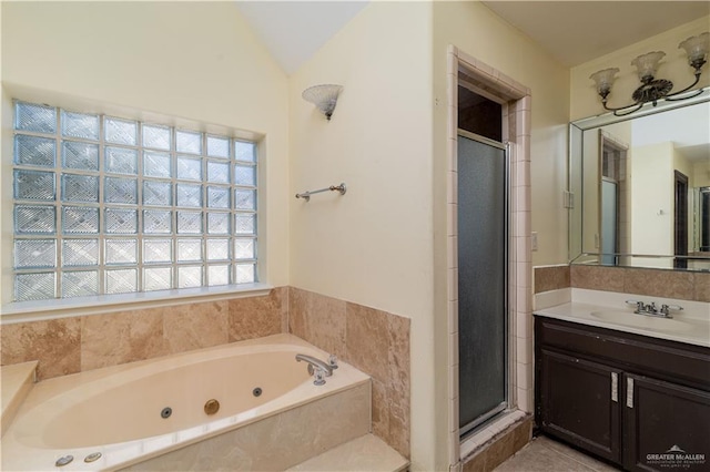 bathroom featuring vanity, plus walk in shower, and vaulted ceiling