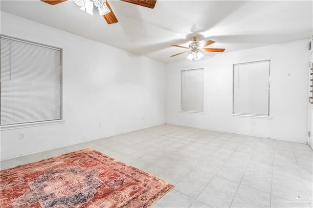 empty room featuring ceiling fan