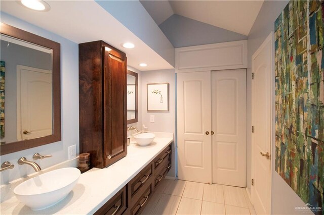 513 S Cynthia St, Mcallen, TX 78501 - full bath featuring double vanity, tile patterned floors, vaulted ceiling, and recessed lighting
