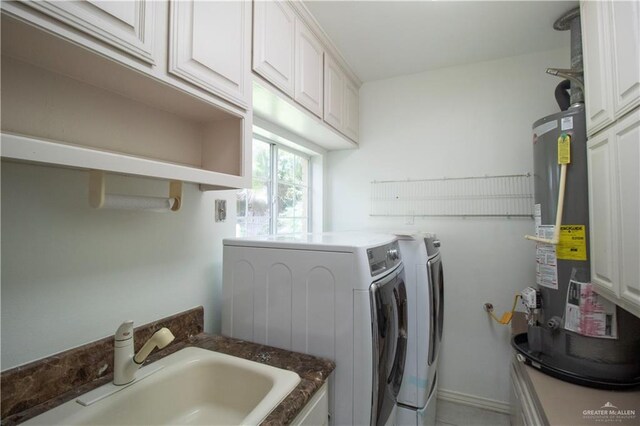 513 S Cynthia St, Mcallen, TX 78501 - laundry area with independent washer and dryer, water heater, and cabinet space