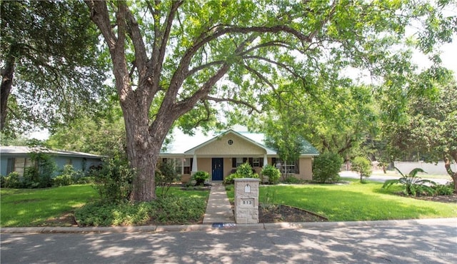 513 S Cynthia St, Mcallen, TX 78501 - view of front of property featuring a front yard