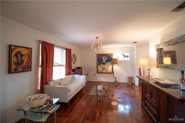 513 S Cynthia St, Mcallen, TX 78501 - living room with dark wood-style flooring and a chandelier