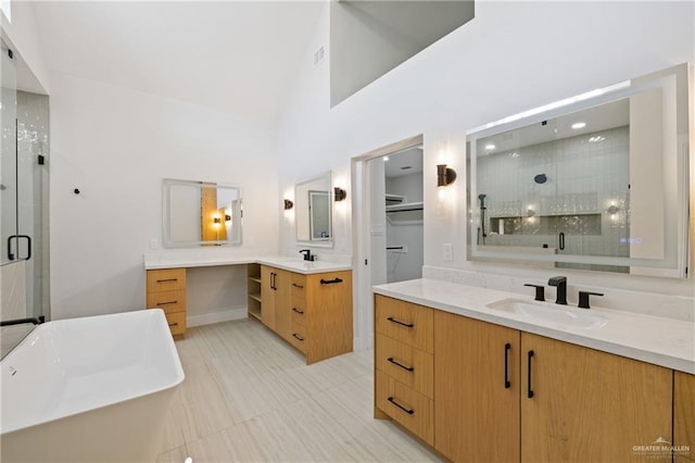 600 Bluebird Ave, Mcallen, TX 78504 - bathroom with a shower stall, two vanities, and a soaking tub