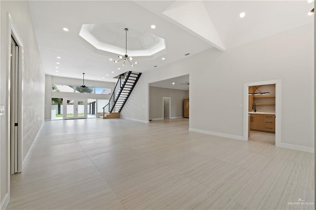 600 Bluebird Ave, Mcallen, TX 78504 - unfurnished living room featuring stairway, french doors, recessed lighting, a chandelier, and baseboards