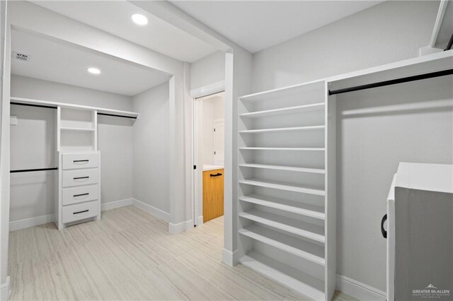 600 Bluebird Ave, Mcallen, TX 78504 - spacious closet featuring light wood-style flooring