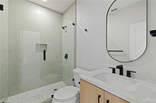 600 Bluebird Ave, Mcallen, TX 78504 - full bath with vanity, a stall shower, and toilet