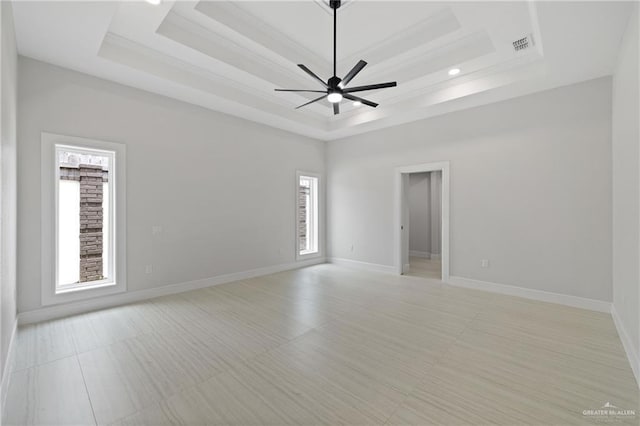 600 Bluebird Ave, Mcallen, TX 78504 - unfurnished room featuring a tray ceiling, plenty of natural light, a ceiling fan, crown molding, and recessed lighting