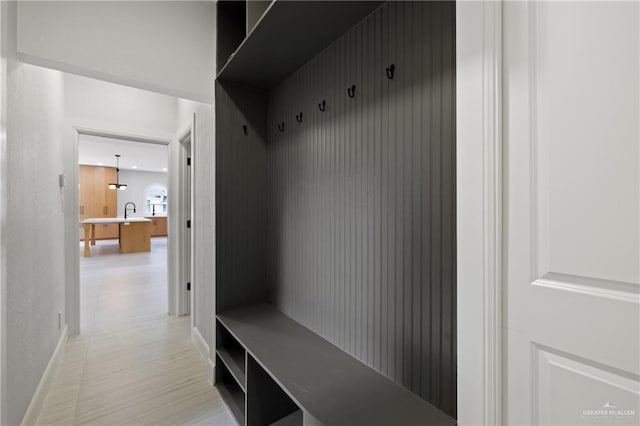 600 Bluebird Ave, Mcallen, TX 78504 - mudroom featuring baseboards